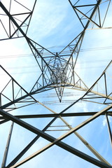 High voltage transmission tower taken from low angle  as abstract background