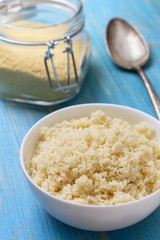 cooked couscous in a white bowl