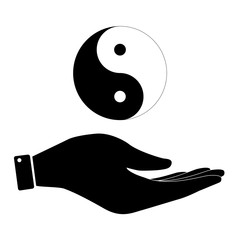 Yin and yang in hand icon