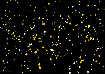 Imitation of gold glitter explosion on black background made of spray paint. Golden festive blow texture of confetti. Golden grunge grainy spray abstract texture of snowflakes. Holiday background.