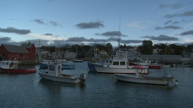 Panning shot of Rockport Harbor at sundown.