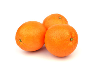 Three oranges on a white background.