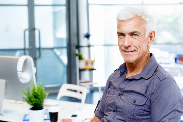 Handsome businessman in office