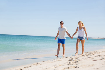 Romantic young couple on the beach