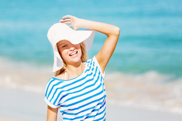 Young woman relaxing on the beach