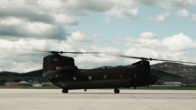 CH-47 Chinook Helicopter taking off.