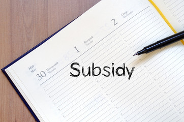 Subsidy write on notebook