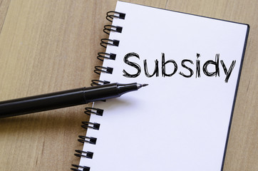 Subsidy write on notebook