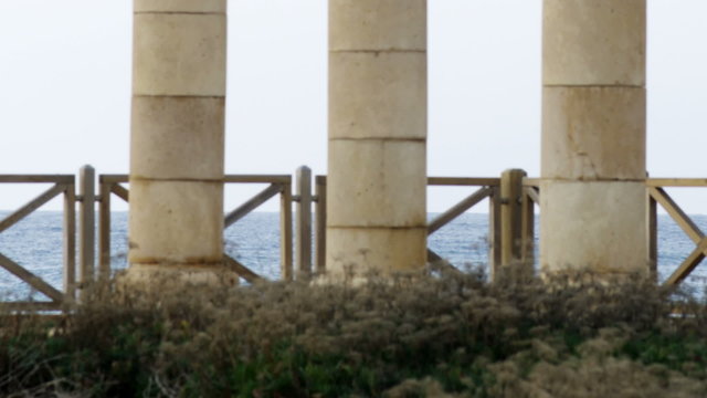 Royalty Free Stock Video Footage of old columns on the seashore shot in Israel at 4k with Red.