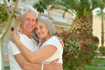 Fototapeta premium Senior couple near hotel resort