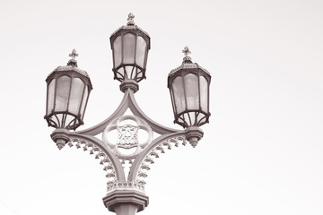 Fototapeta na wymiar Lamppost, Westminster Bridge, London in Black and White Sepia Tone