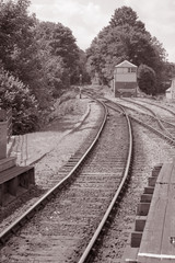 Fototapeta na wymiar Railroad Track in Black and White Sepia Tone