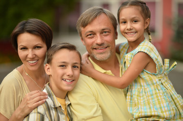 Family resting in  summer park