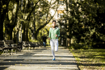 Young woman running in the park