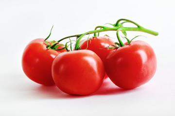 Delicious fresh ripe tomatoes. Shallow depth of field. Selective focus.