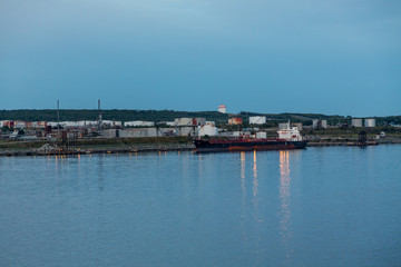 Fototapeta na wymiar Tanker on Coast at Dusk