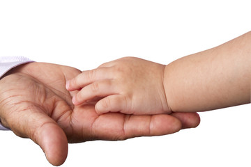 Small child's hand reaches for the big man or grand father hand