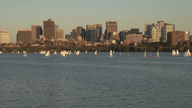 Boston from across the Charles River at sunset.