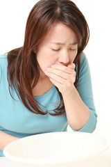 Japanese woman feels like vomiting 