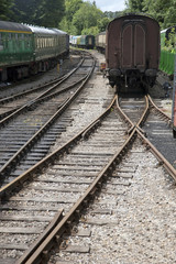 Fototapeta na wymiar Railroad Carriages on Railway Tracks