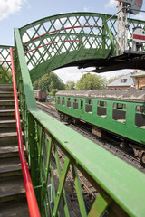 Green Train Carriage at Station