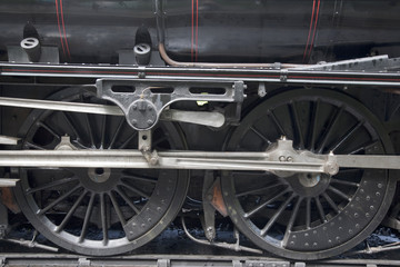 Fototapeta premium Steam Train Wheel on Tracks