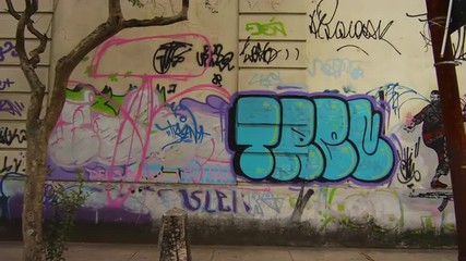 Tracking shot of a wall covered in graffiti in Rio de Janeiro, Brazil