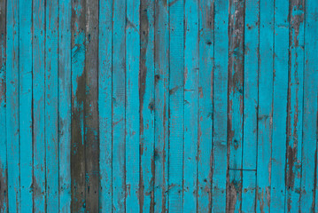 Fototapeta na wymiar Old blue fence.