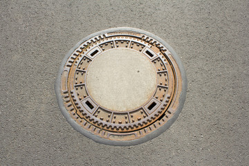 Canal lid on the street in Germany