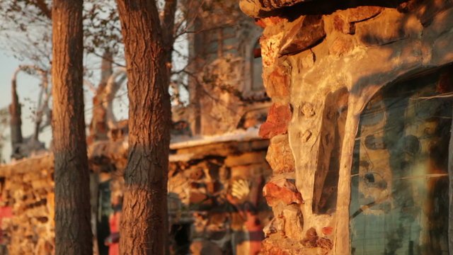 Close-up of rock walls with inlaid glass.