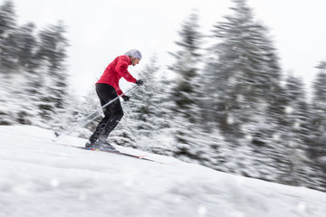 Fototapeta na wymiar Cross-country skier in blur motion