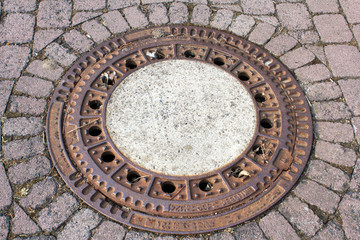Canal lid on the street in Germany