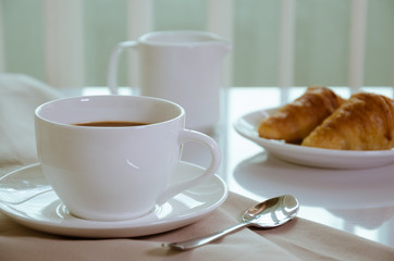 Cup of Coffee and Croissant for Breakfast.
