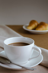 Cup of Coffee and Croissant for Breakfast.
