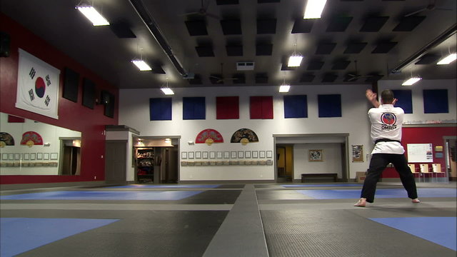 Man performing Tae Kwon Do.
