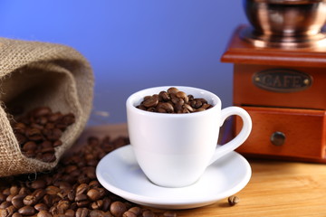 manual coffee grinder ,beans and cup