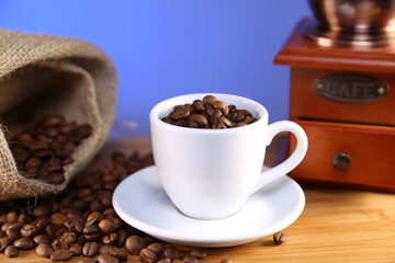 manual coffee grinder ,beans and cup