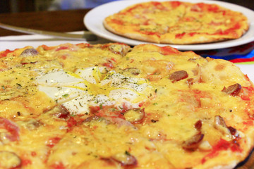 tasty pizza cooked in pizzeria