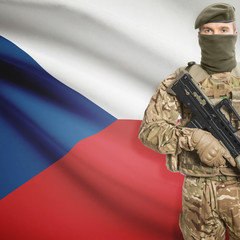 Soldier with machine gun and flag on background - Czech Republic