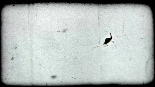 Charter plane flies through sky. Vintage stylized video clip.