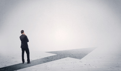 Standing salesman looking ahead with arrow