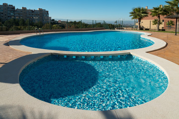 View of the swimming pool in the urbanization Altorreal. Region of Murcia. Spain