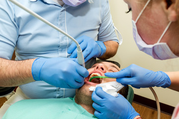 Dentist doing a dental treatment on a patient