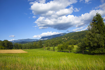 Fototapeta premium Landscape view from Savoy, Rone - Alps, France. Farmland between annecy and Aix -les-Bain