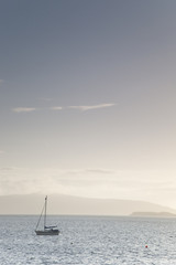 Fototapeta premium Boat off Isle of Skye Shore, Scotland