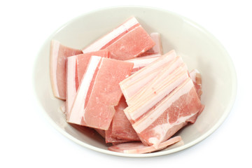 Bacon, streaky pork slice on white background