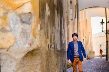 Fototapeta na wymiar portrait of young man, dressed in a blue jacket