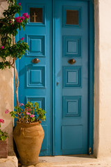 Fototapeta na wymiar Colored door in Parikia - Paros - Greece