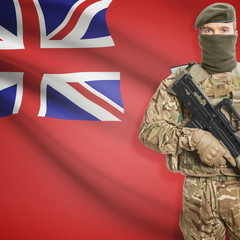 Fototapeta premium Soldier with machine gun and Canadian province flag on background series - Manitoba