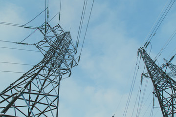 Big frosty power lines among winter.